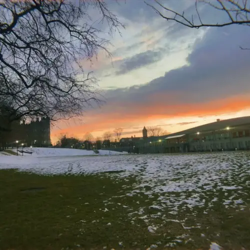 Haber Green with some snow and a sunset.