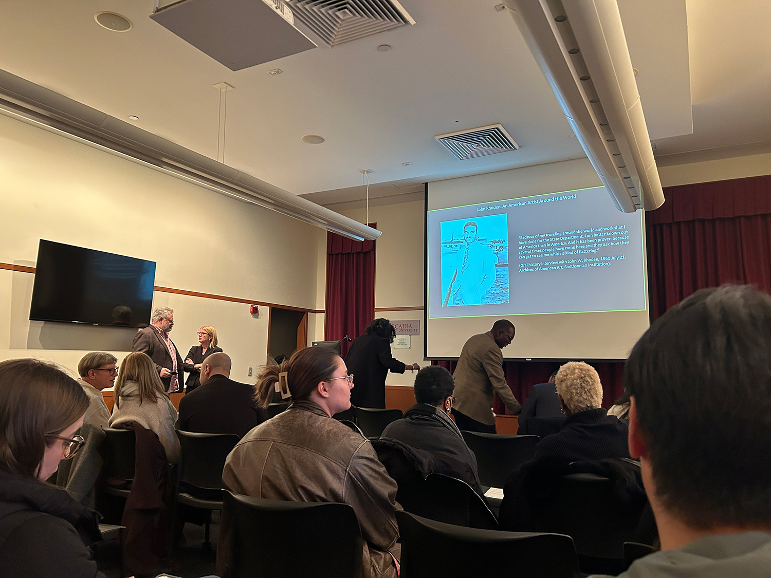 Inside the Beaver College Room before the lecture.