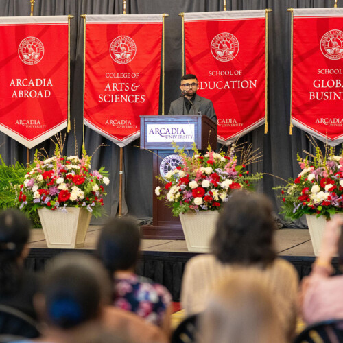 Student speaker Jay Mehta ’20MEd, ’28EdD on stage at Honors Convocation.