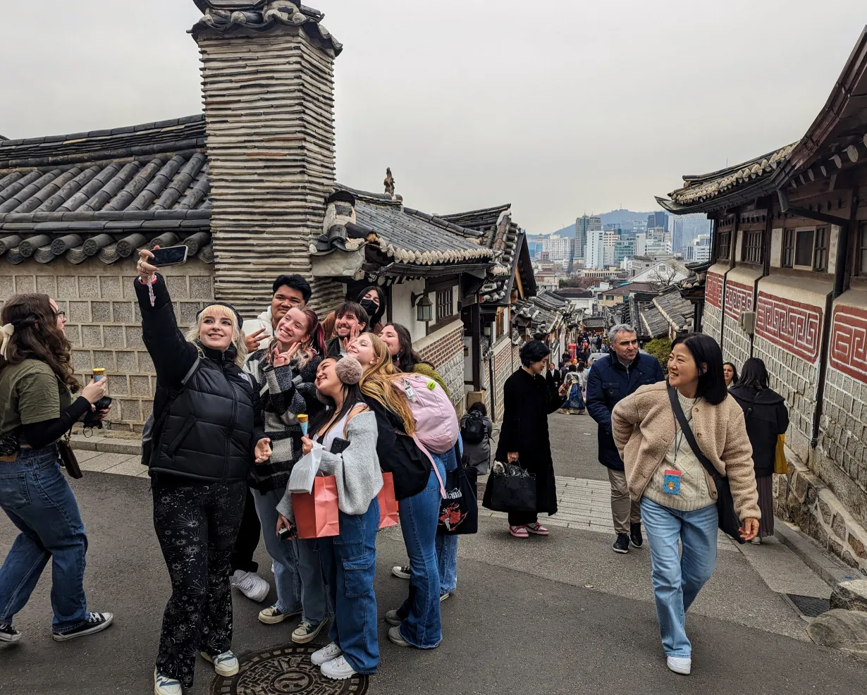 students in South Korea taking a picture together