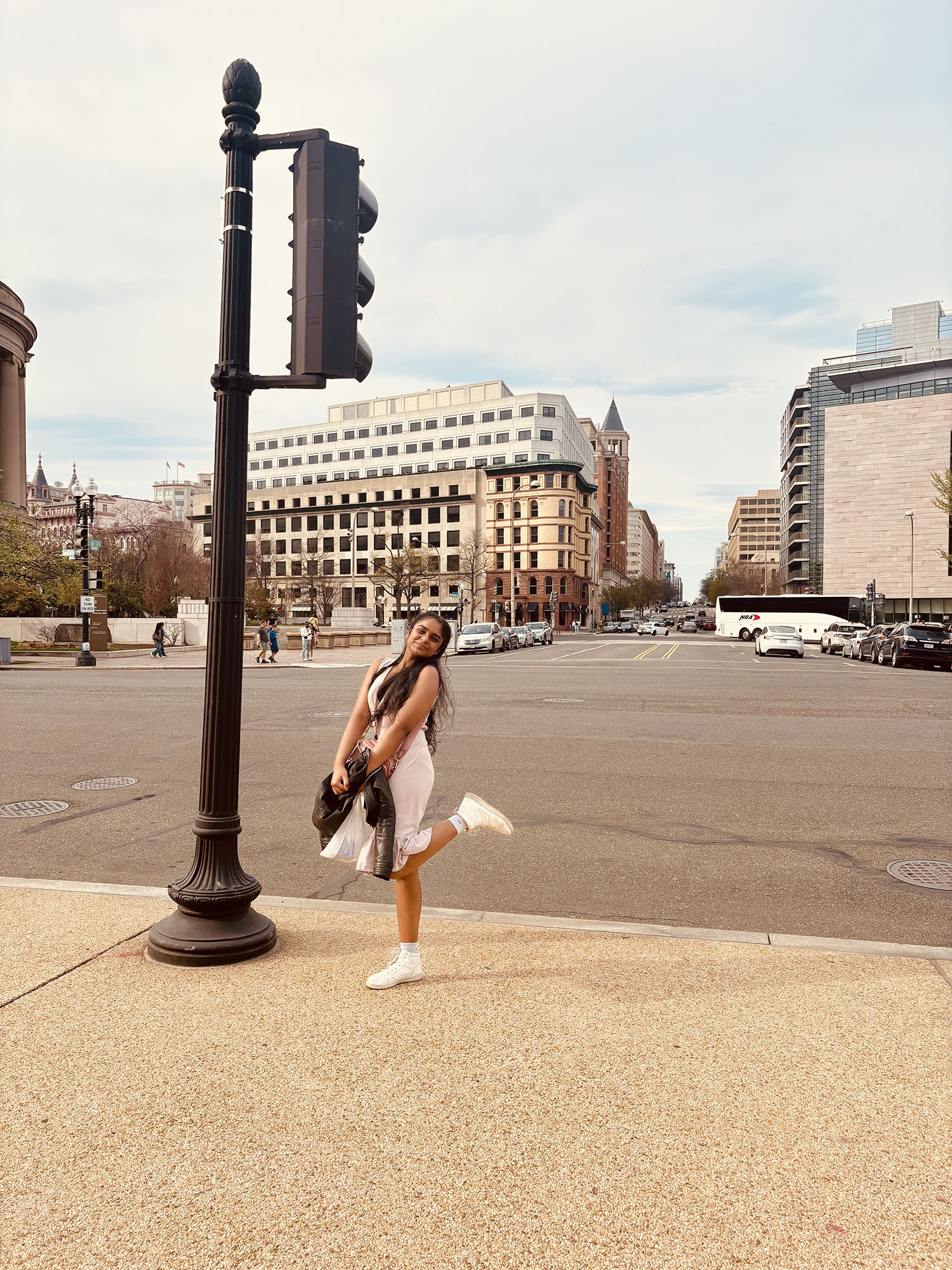 Nagajyothi Ravilla ’25 posing next to a light pole.