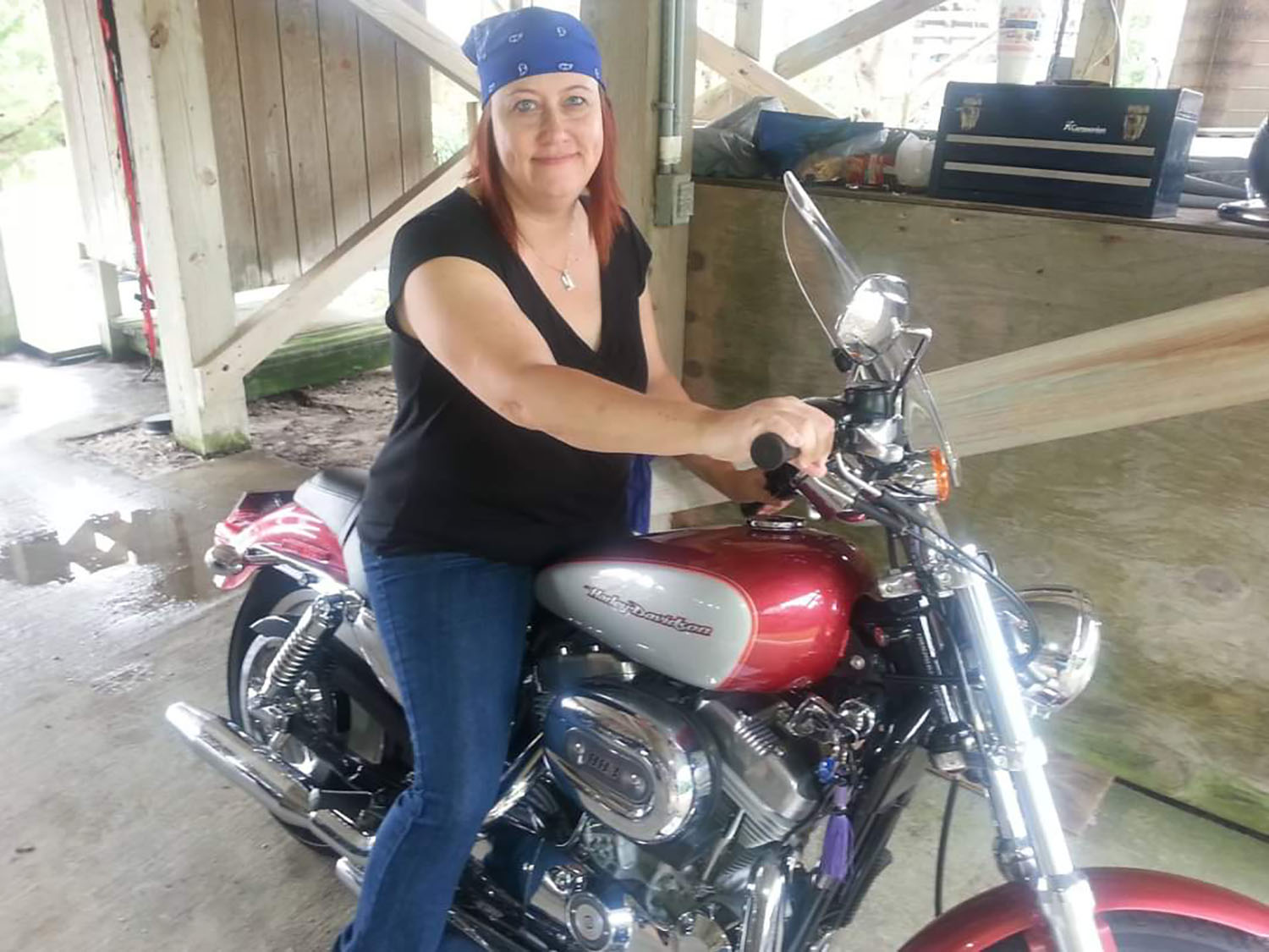 Camille Norvaisas ’25MFA on a motorcycle.