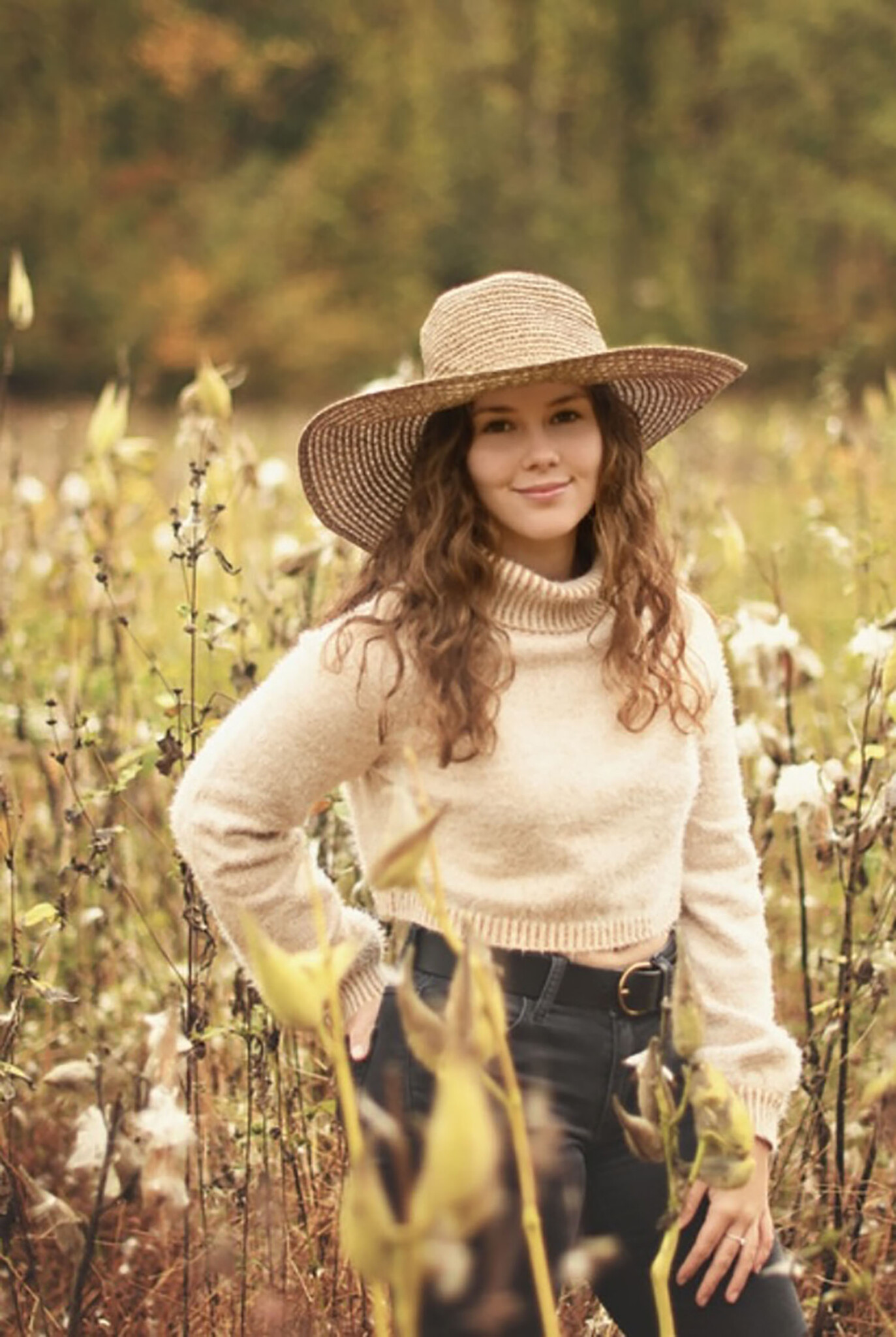 Zoey Ritter ’25 in a field of flowers.