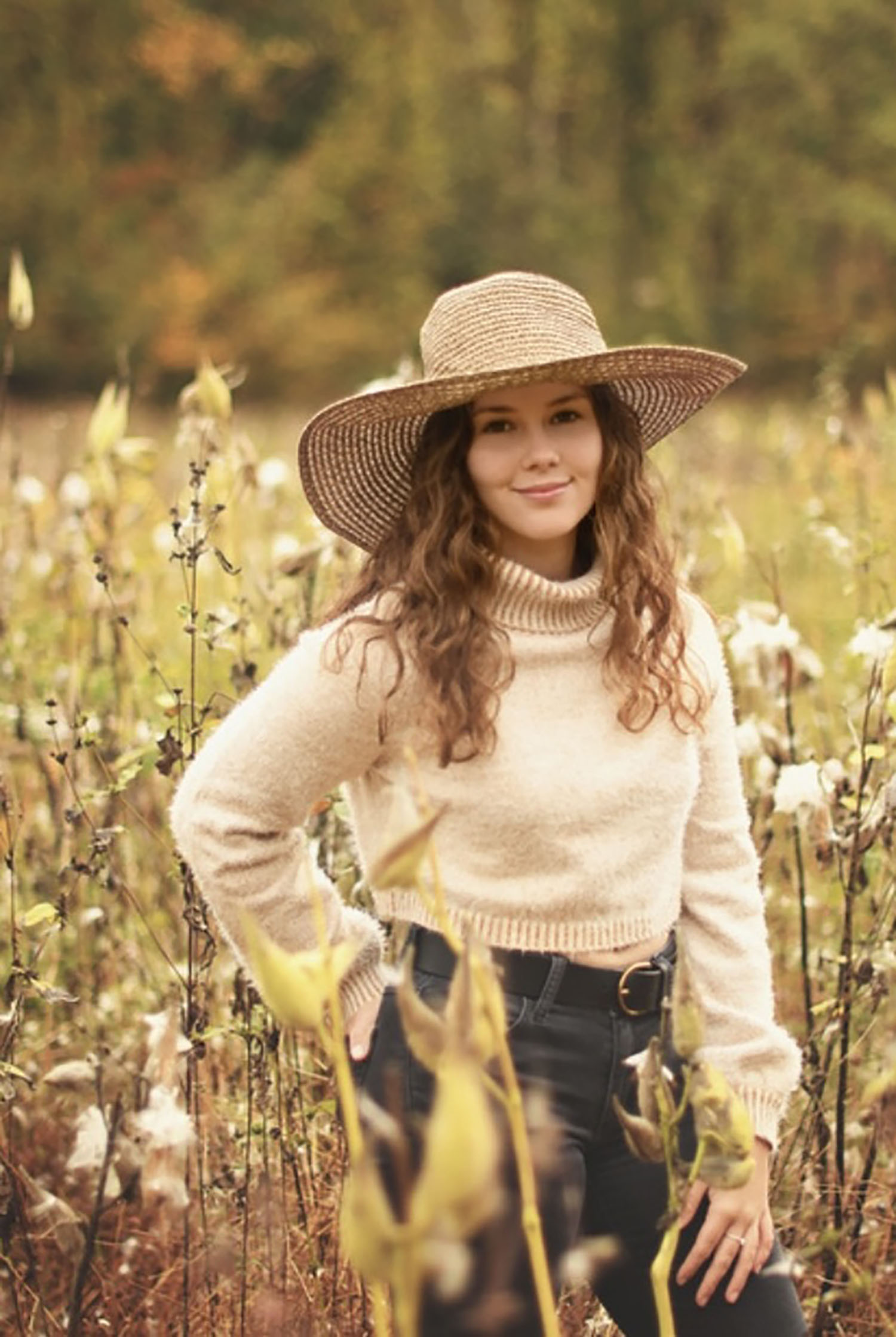 Zoey Ritter ’25 in a field of flowers.