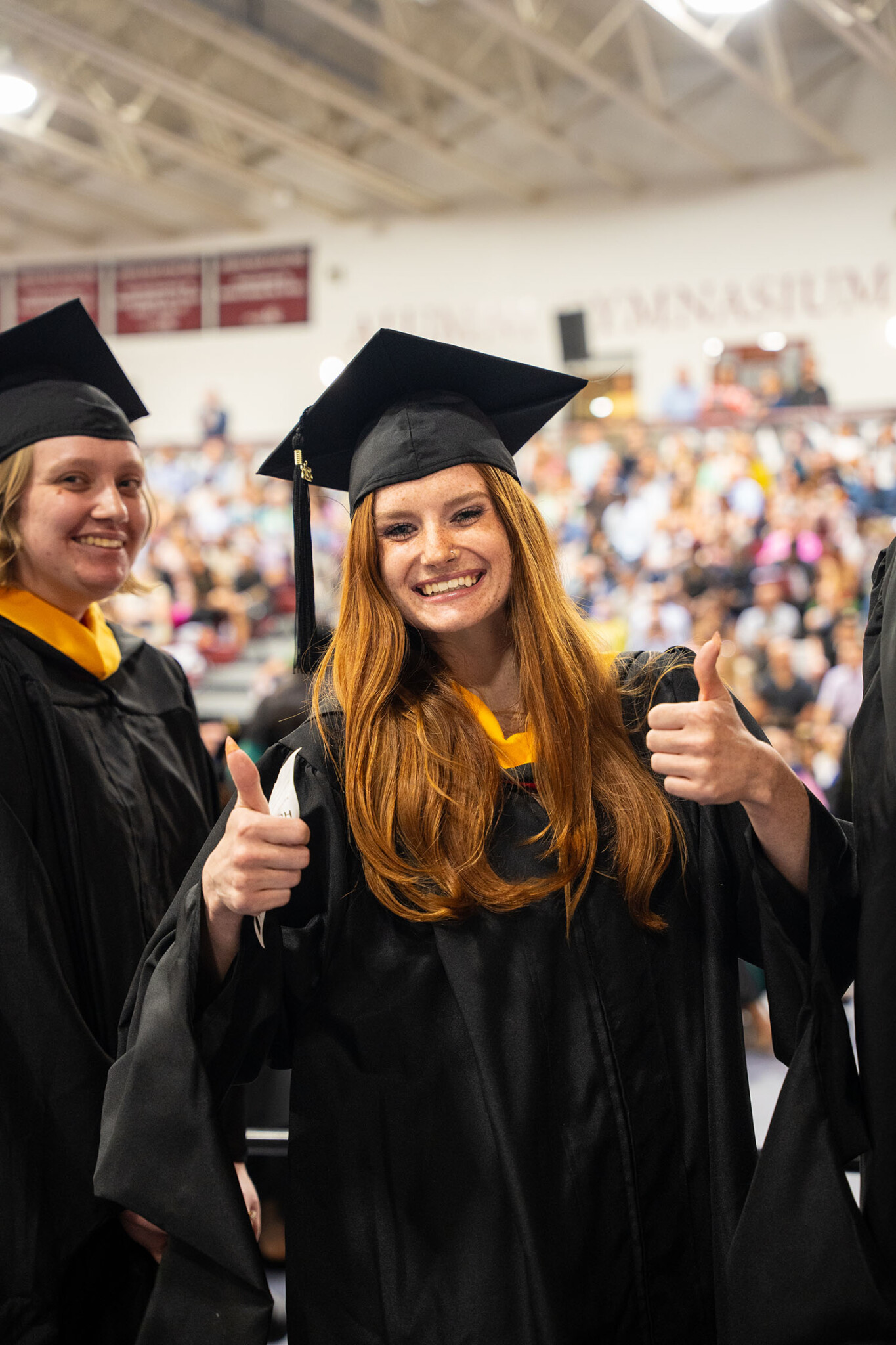 A student giving a thumbs up.