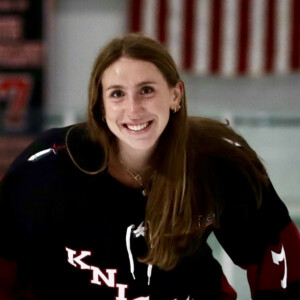 Morganne Dee ’25 in ice hockey gear.