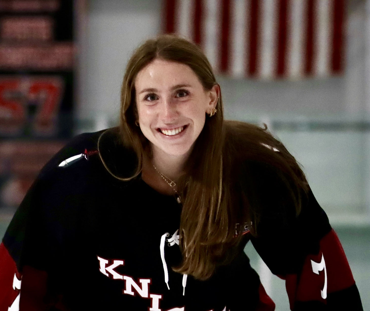 Morganne Dee ’25 in ice hockey gear.