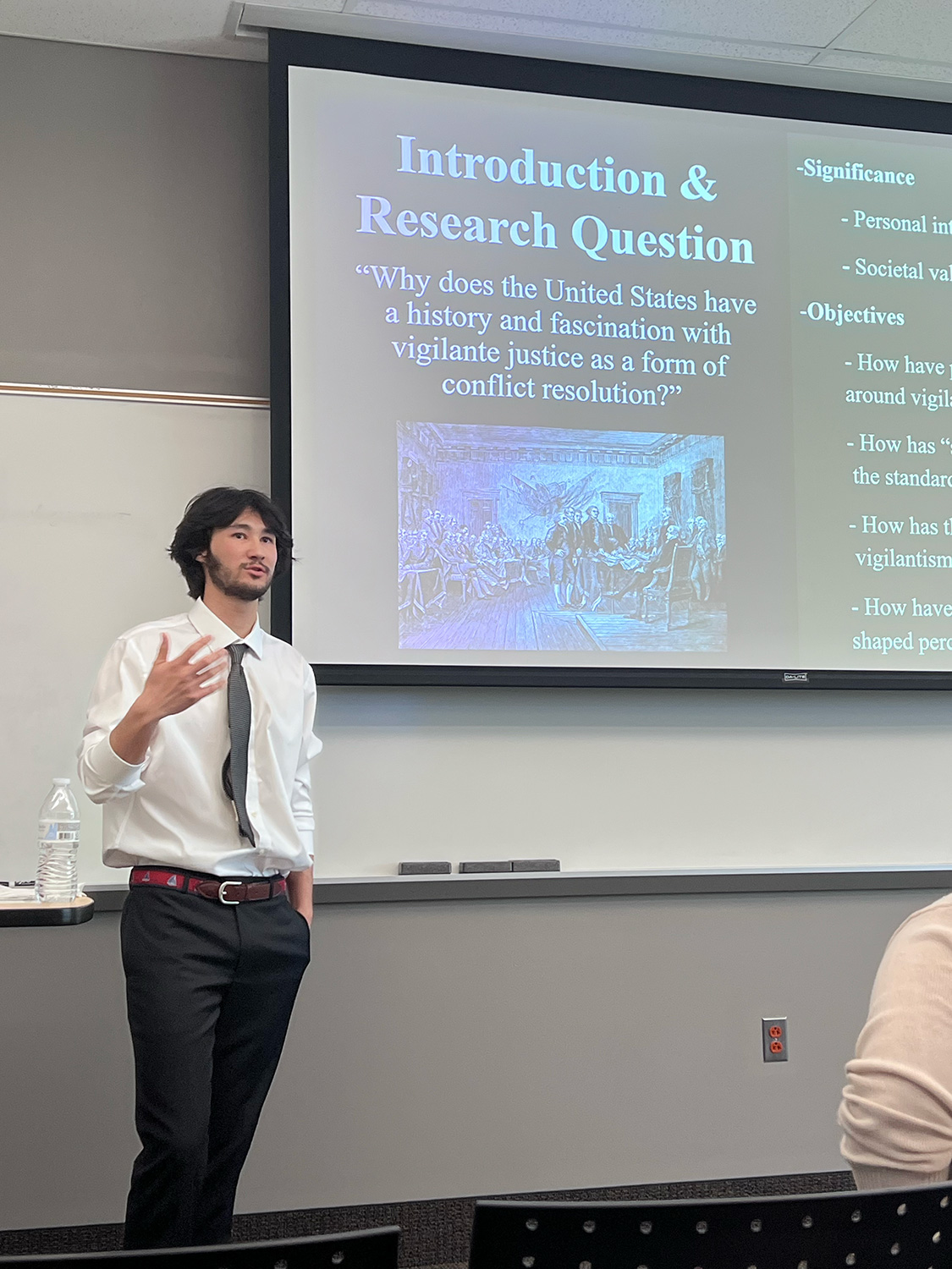 Liam Preyer ’25 presenting research.