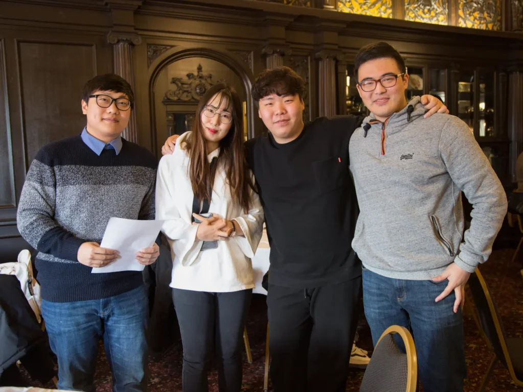 Four international students pose for a picture at the International Students Lunch.