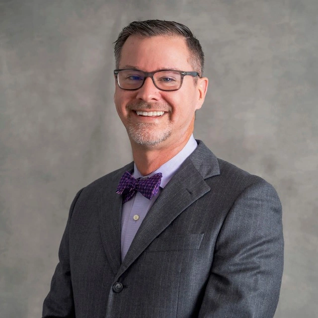 Headshot of Todd Hacker '00, '02M.