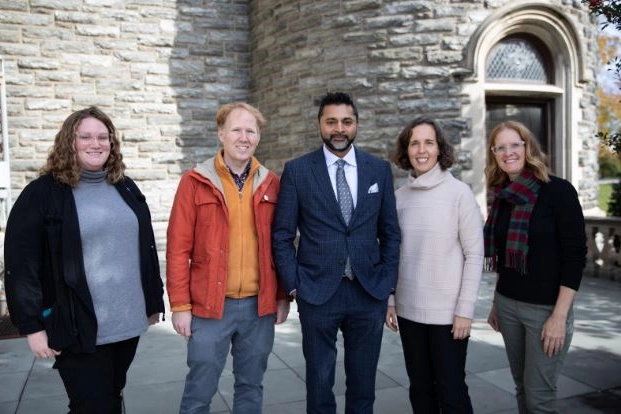 The members of the Arcadia Public Art Project pose for a picture with President Ajay Nair.