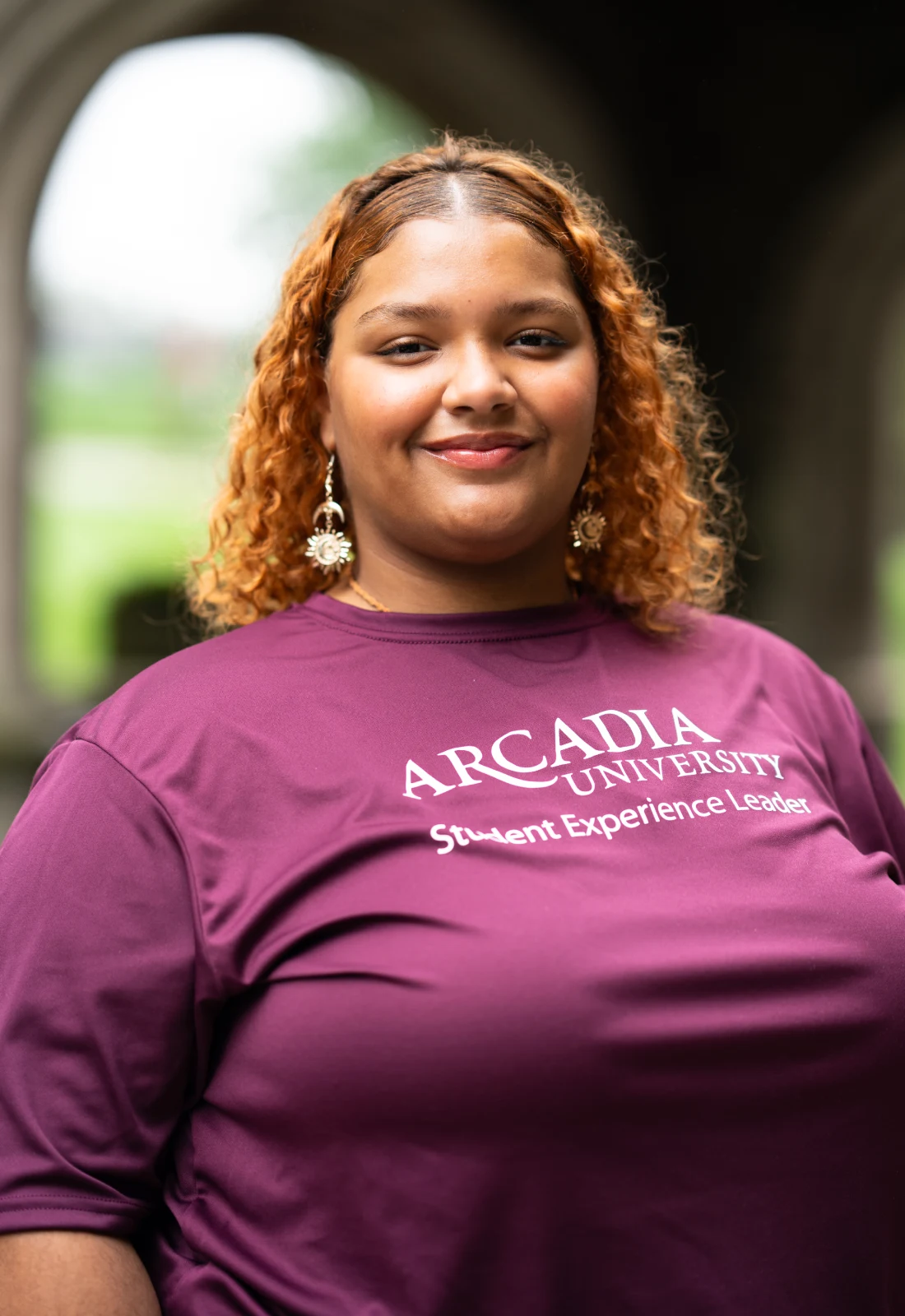Headshot of Jamerika Grandberry wearing a purple Student Experience Leader t-shirt.