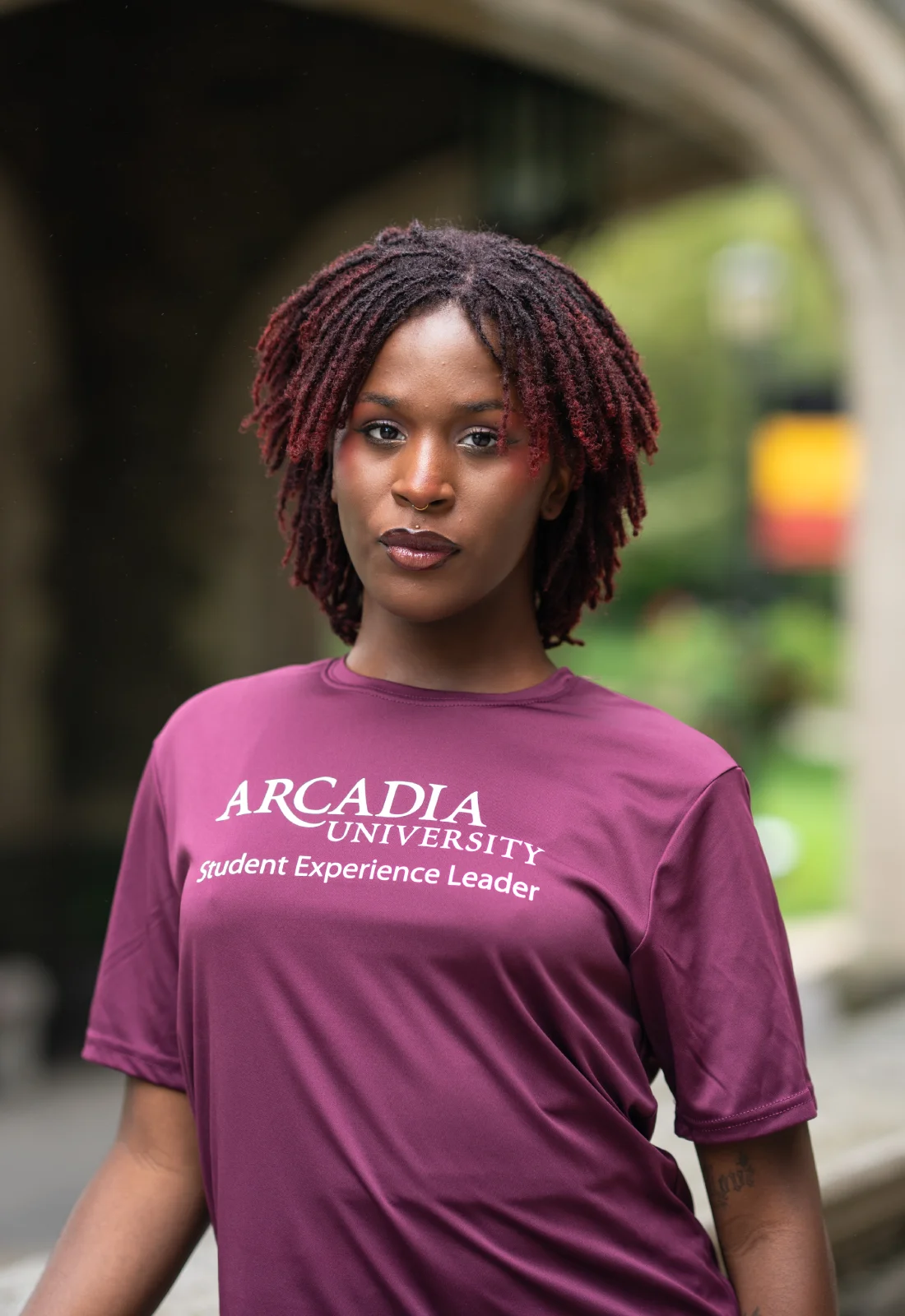 Headshot of Zyah Rose Fall wearing a purple Student Experience Leader t-shirt.