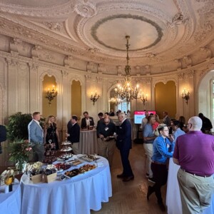 Business leaders, educators, and workforce innovators networking in Grey Towers Castle.