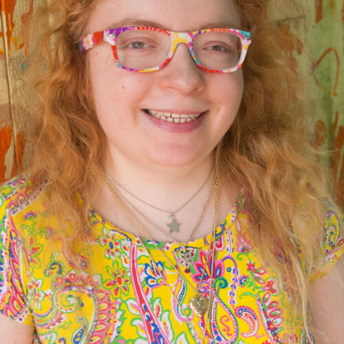 Parlin Gressitt ’26 wearing rainbow glasses.