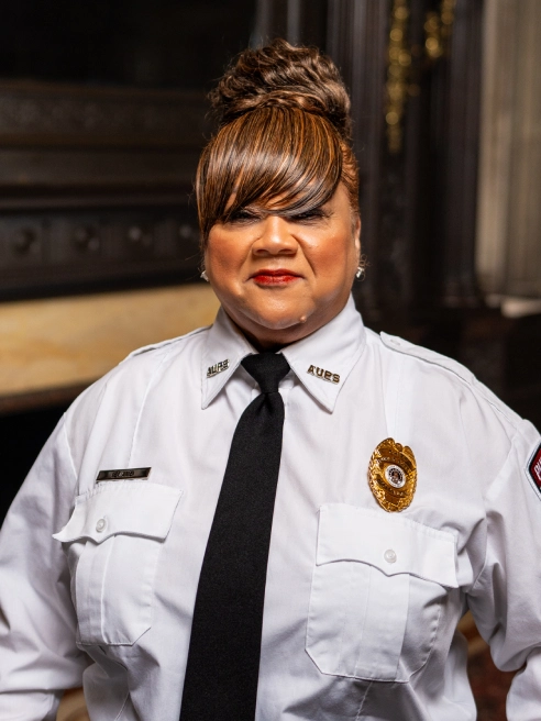 Ruth A. Evans smiles while wearing her Public Safety uniform.