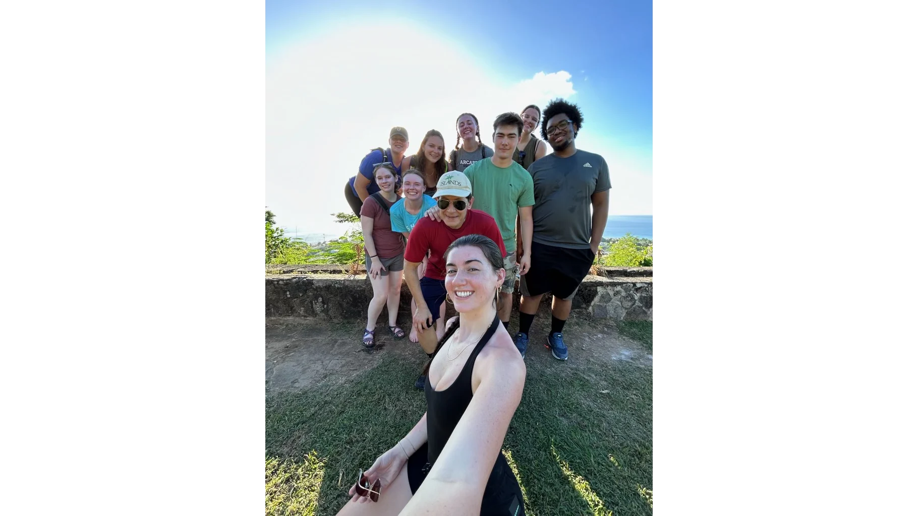 A group of Arcadia students take a selifie during a study abroad experience in Dominica.