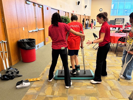 Members of Arcadia's Department of Physical Therapy help students during Health Career Summer Academy