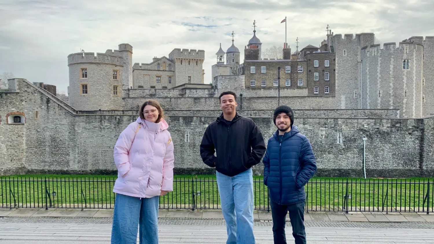 Three Arcadia students pose for a picture in London, England.
