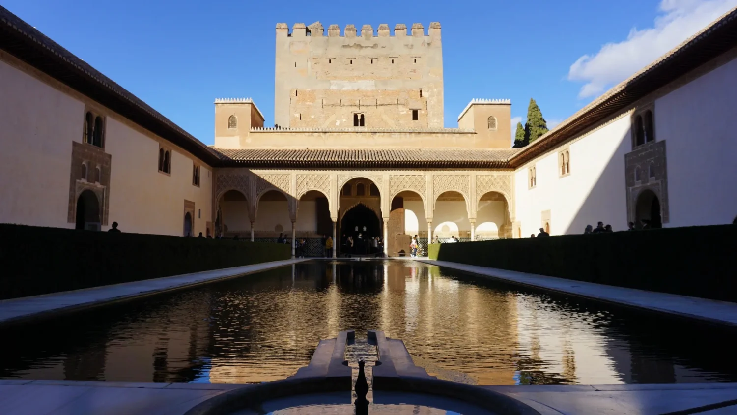 A photo of the fountain inside the Alhambra Palace in Granada, Spain.