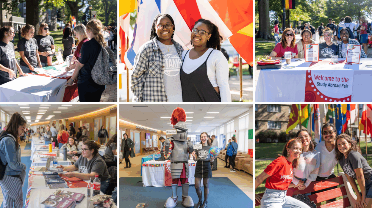 students at the study abroad fair, smiling, chatting with fellow students, international flags in the background