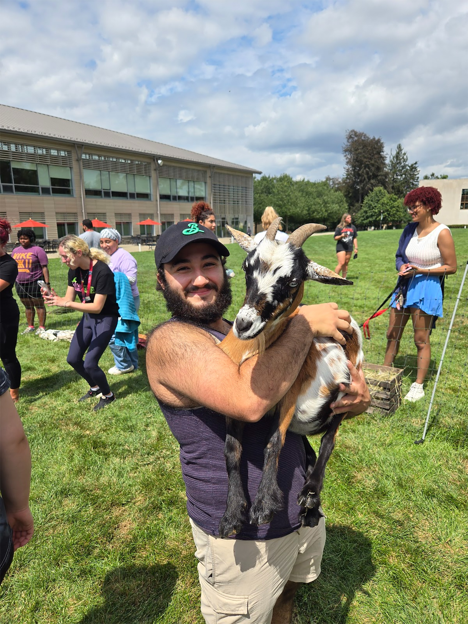 Corin DeStefano ’27 holding a goat.