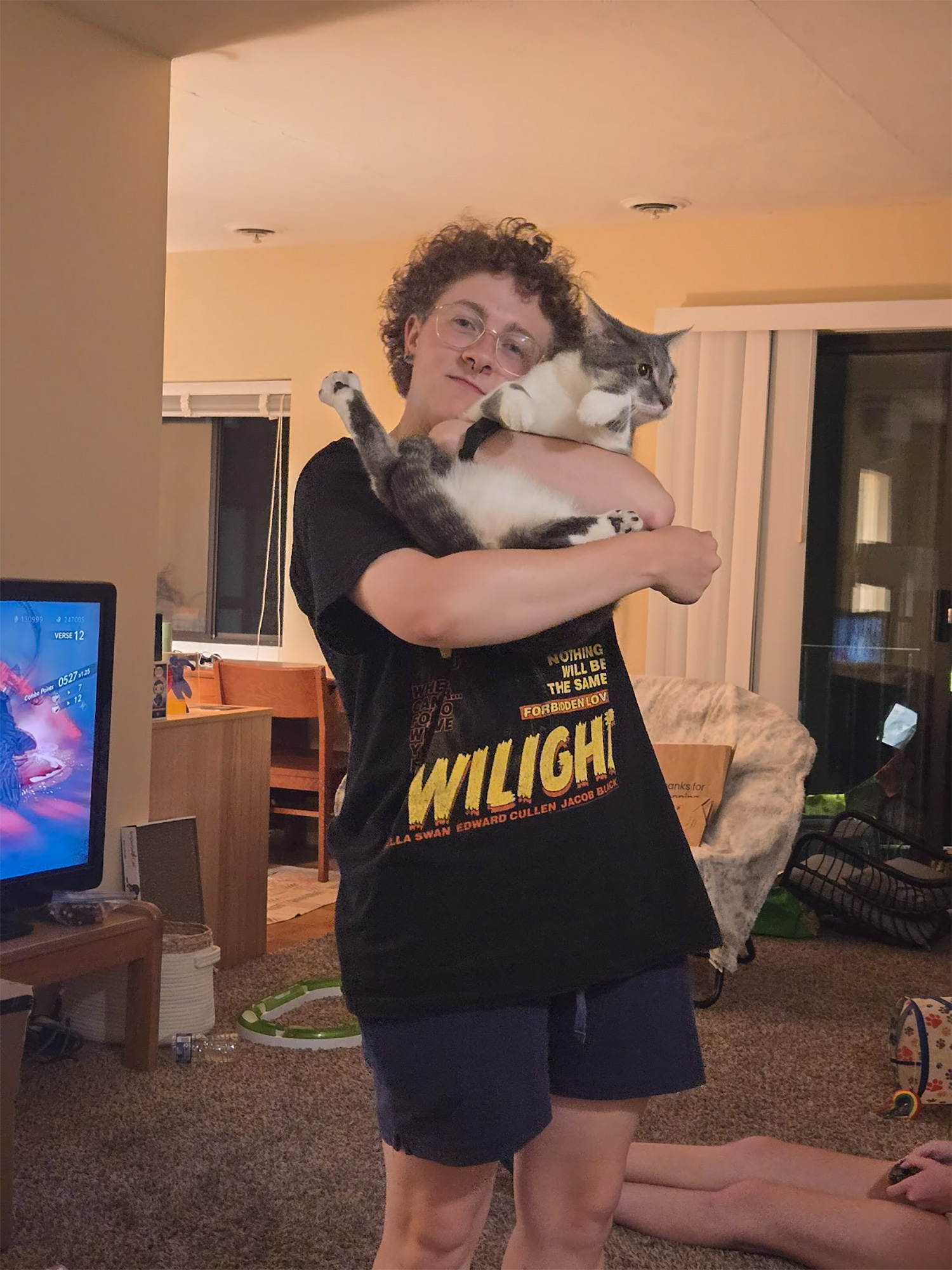 Corin DeStefano's friend holding a cat.