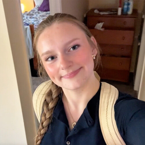 Devon Young ’28 in her apartment.