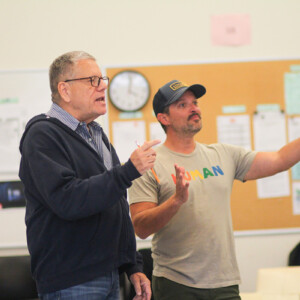 Kevin Glaccum working with an actor during rehearsals
