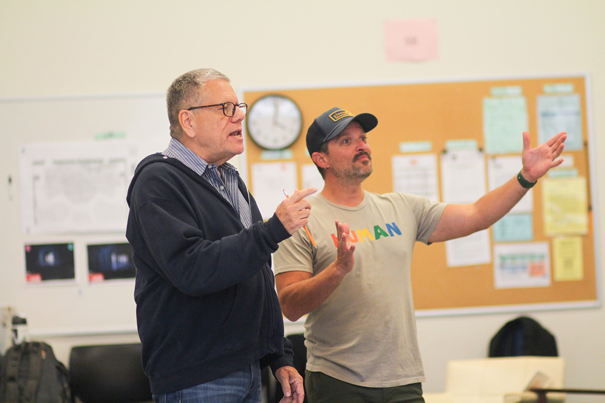 Kevin Glaccum working with an actor during rehearsals
