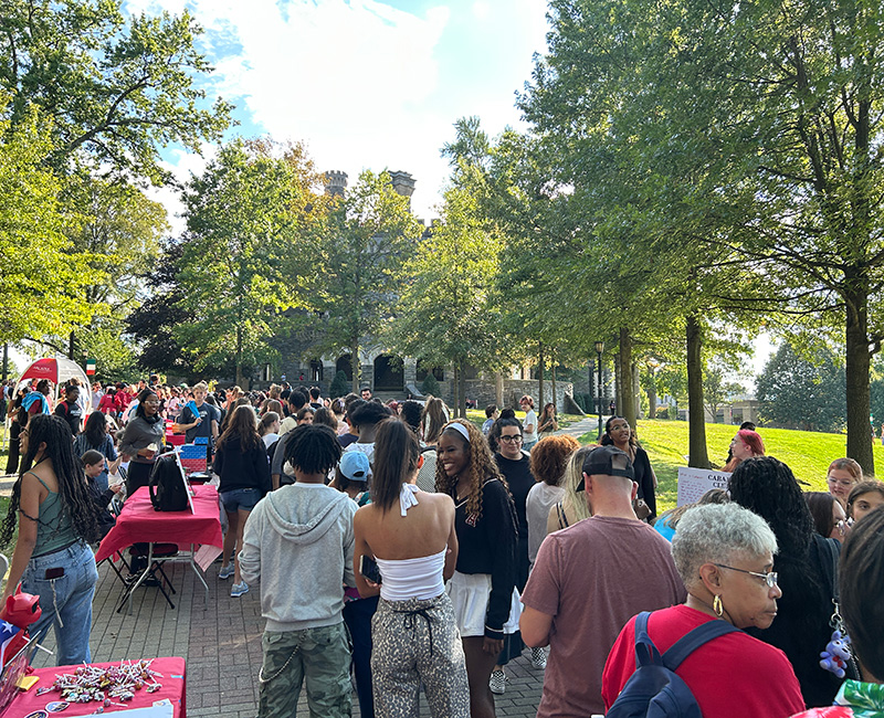 Members of Arcadia community gather on the walk of pride prior to rock the knight