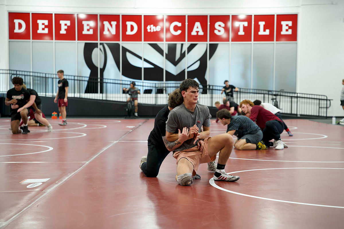 Arcadia men's wrestling team at practice before their first meet.