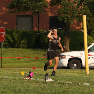 Anthony Barber ’29 with a javelin.