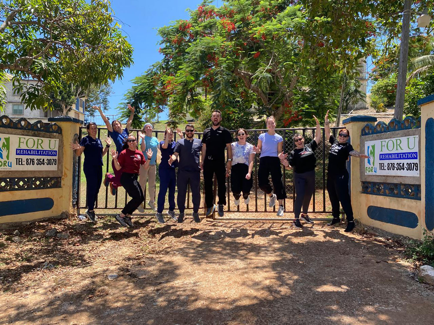 Doctor of Physical Therapy students outside For U Rehabilitation in Jamaica.