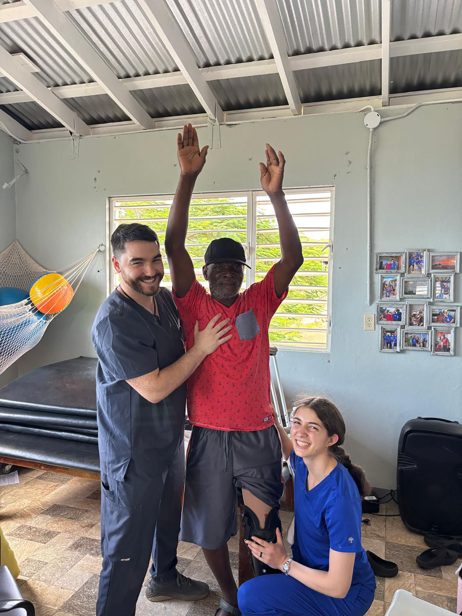 Doctor of Physical Therapy students assisting a patient in Jamaica.