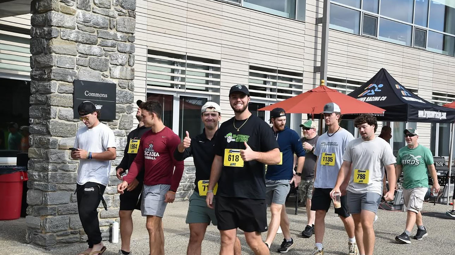 Students walking past the Commons during the THO 5K.