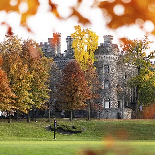 A view of Arcadia University's historic Castle on a leafy fall day.