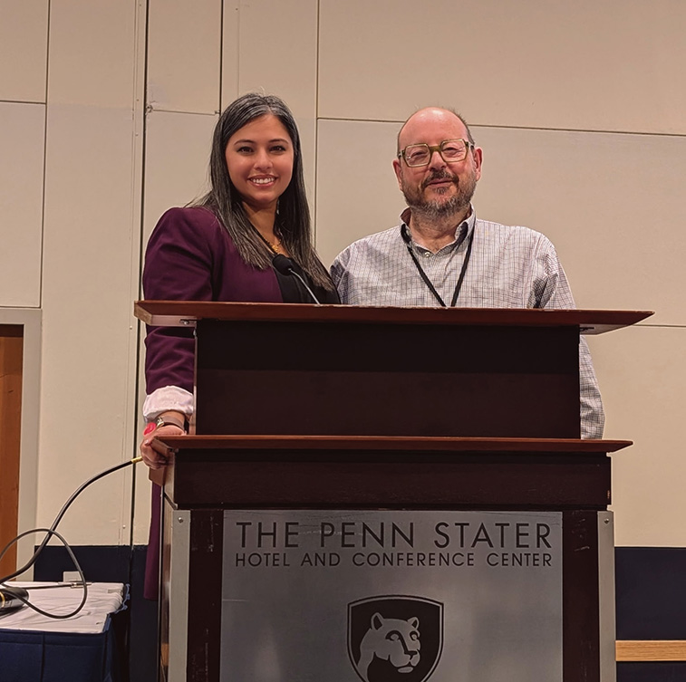 Peter Appelbaum behind a lectern.