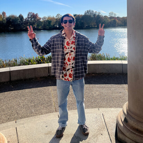 Samuel Santos giving peace signs with both hands