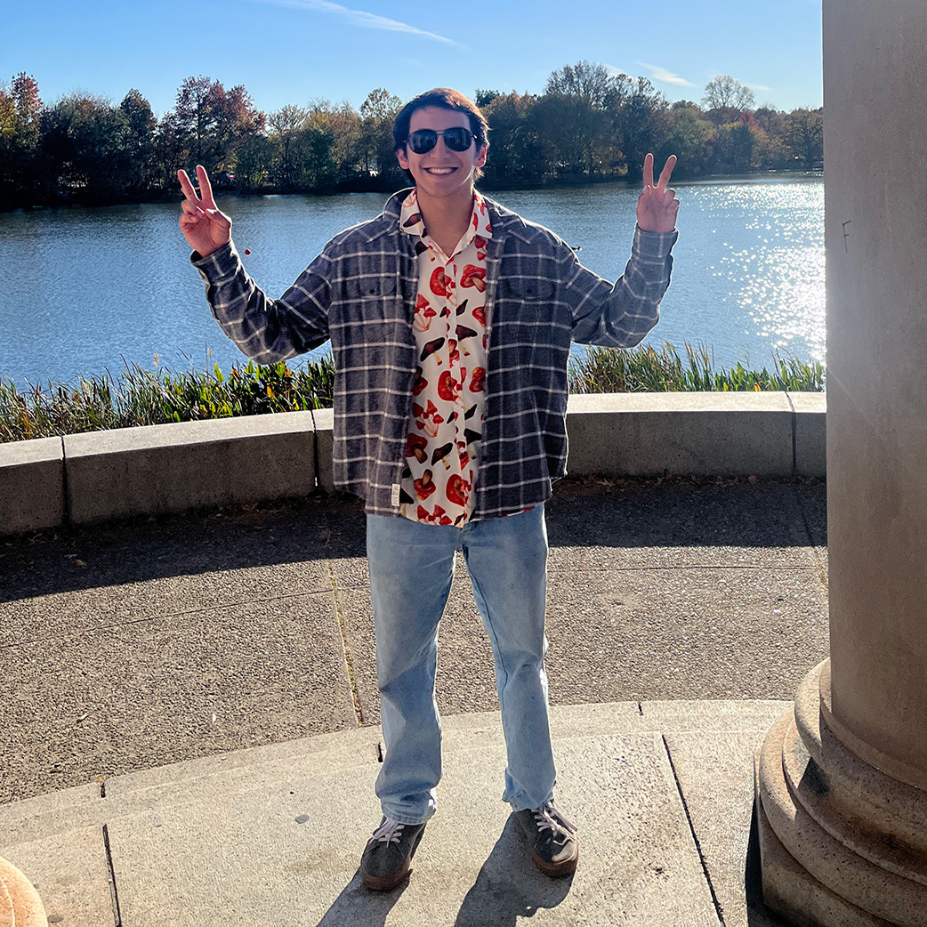 Samuel Santos giving peace signs with both hands