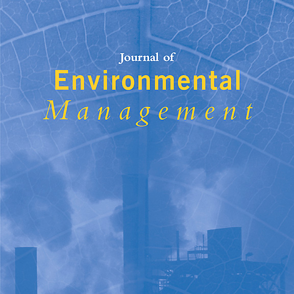 Cover of the Journal of Environmental Management. Blue with various environment designs.