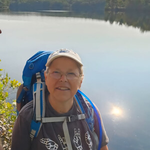 Gina Adams ’14, ’27 hiking.