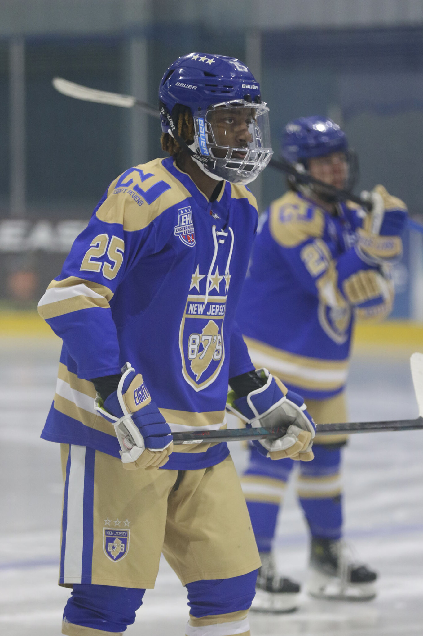 Nate McFarlane ’29 playing ice hockey.
