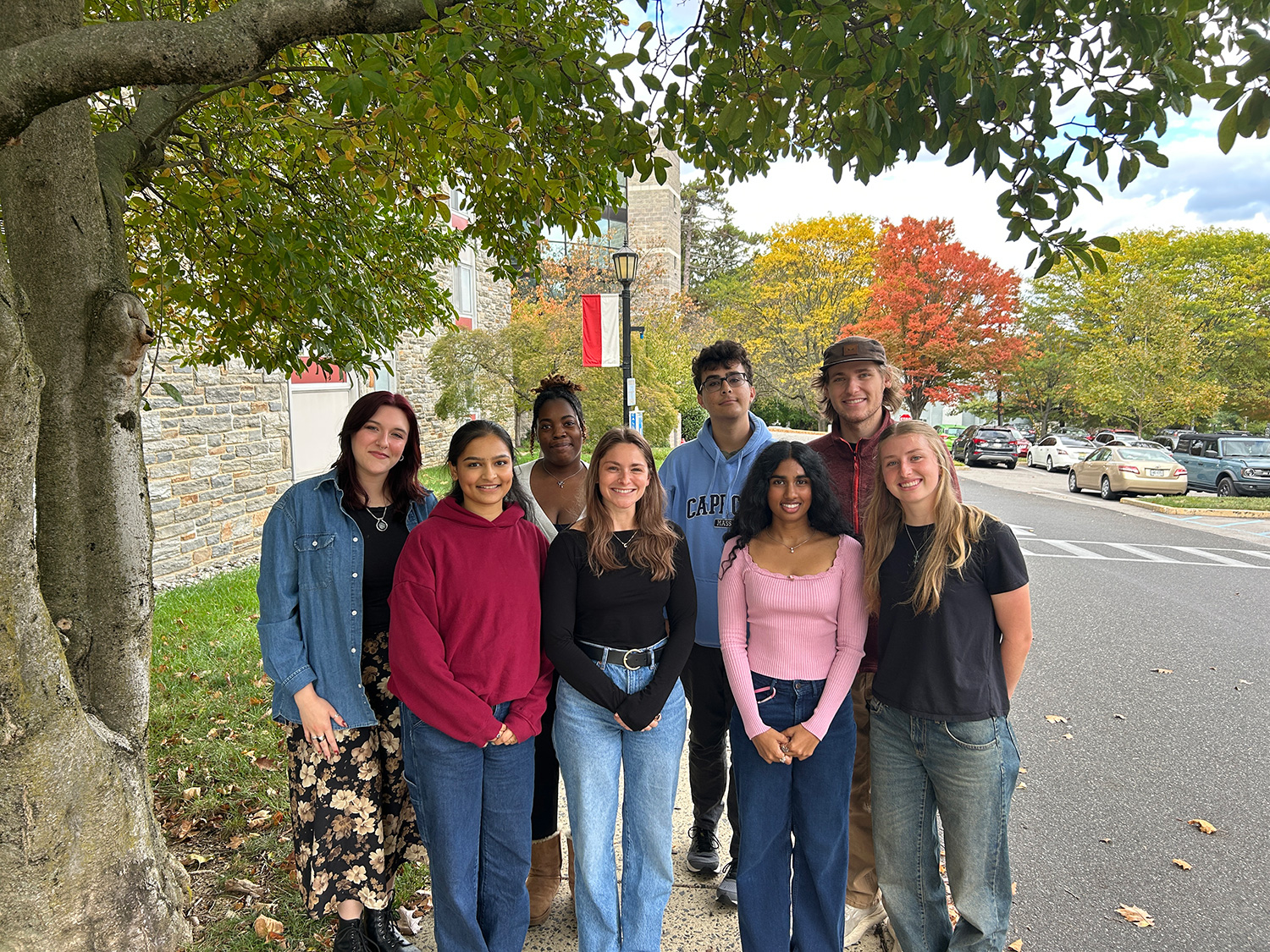 Catherine Christian, peer editors, and graduate assistants outside of Heinz Hall.