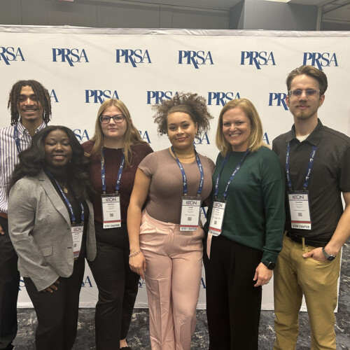 Students from Arcadia's PRSSA chapter and Dr. Chris Mullin.