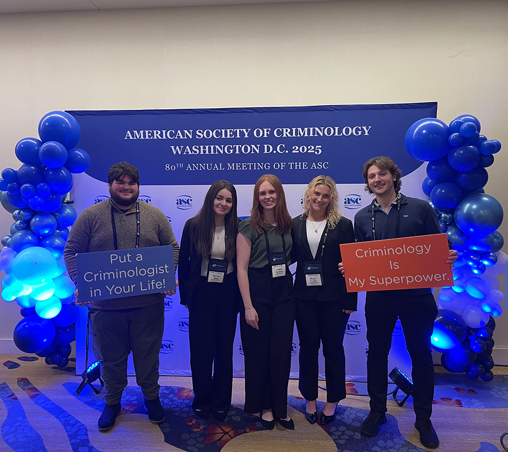Arcadia University criminal justice students pose for a photo at a conference