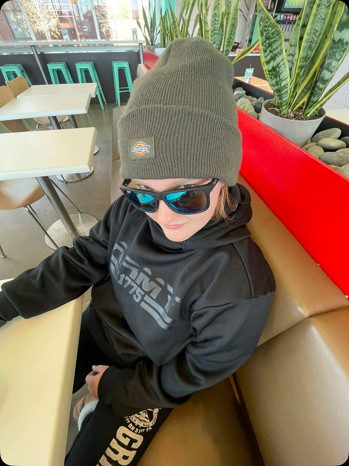 Daphne Ellenson ’29 wearing sunglasses and a beanie.