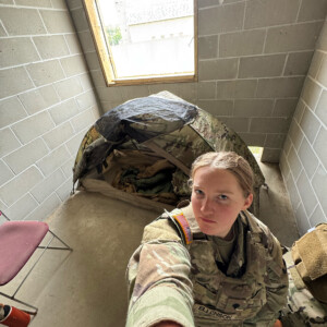 Daphne Ellenson ’29 in military gear.