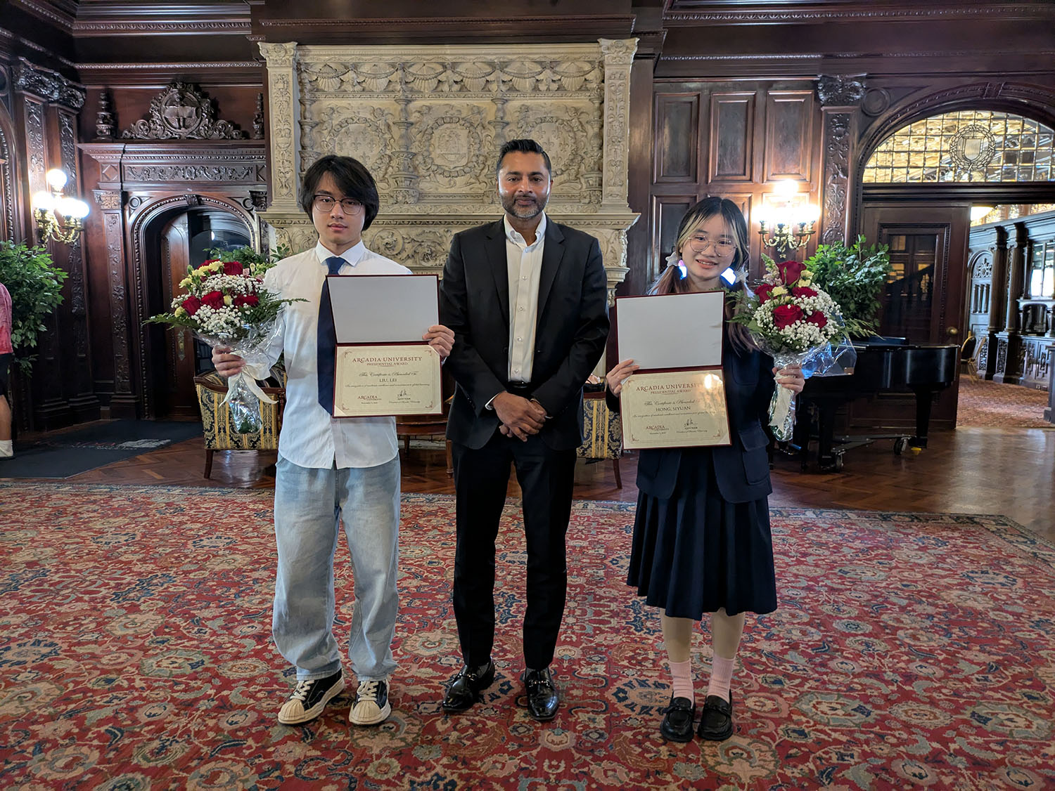 Siyuan Hong ’27 and Lei Liu ’27 with President Nair.