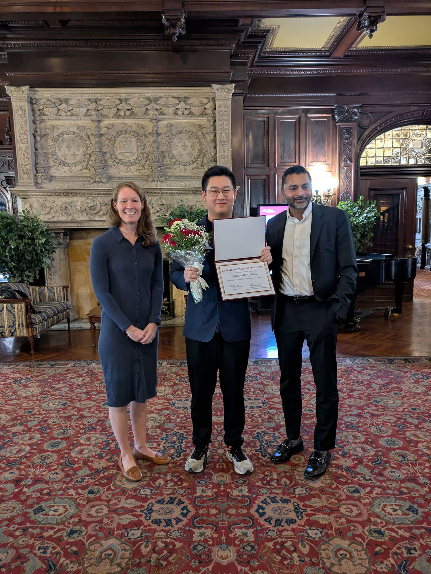 Chengxuan Qian ’26 with President Nair and Jess Doyle Ketterlinus.